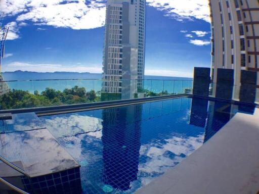 Outdoor swimming pool with ocean view