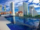 Skyscrapers and buildings view from a rooftop pool