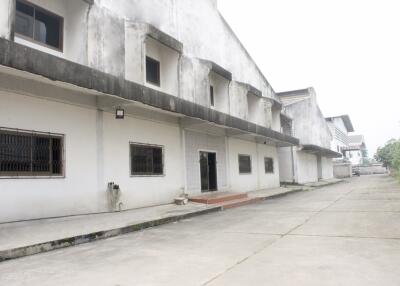 Exterior view of a concrete industrial building