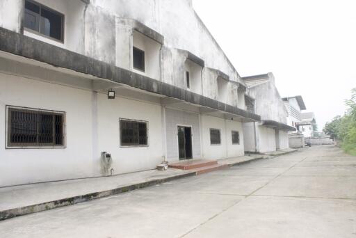 Exterior view of a concrete industrial building