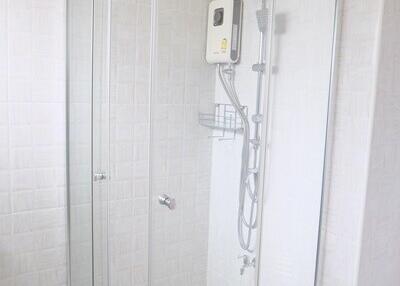 Shower with glass enclosure