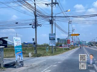 Street view with signs and buildings in the background