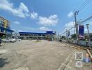 Large commercial building with ample parking