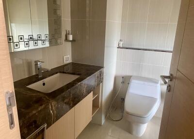 Modern bathroom with a sleek sink and toilet