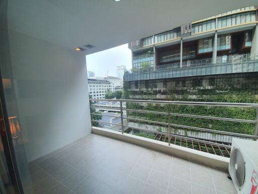 Balcony view with buildings in the background