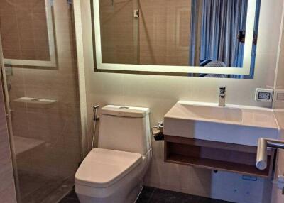 Modern bathroom with shower and floating vanity