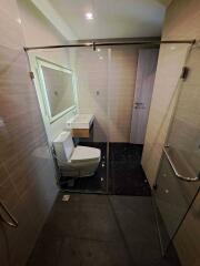 Modern bathroom with glass shower door