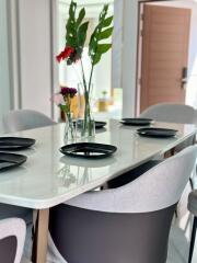 Modern dining room setup with table and chairs