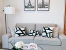 Modern living room with a grey sofa and decorative pillows