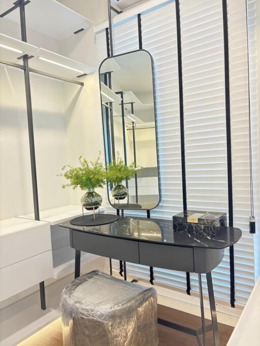 Modern bedroom vanity area with mirror