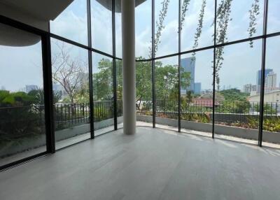 Living area with large windows and city view