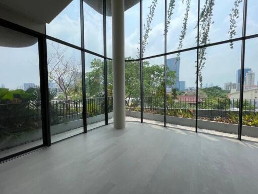 Living area with large windows and city view