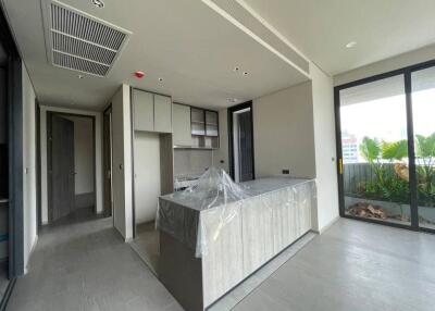 Modern kitchen with island and sliding glass doors