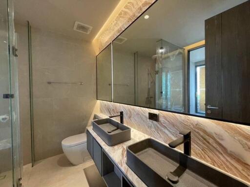 Modern bathroom with double sink and large mirror