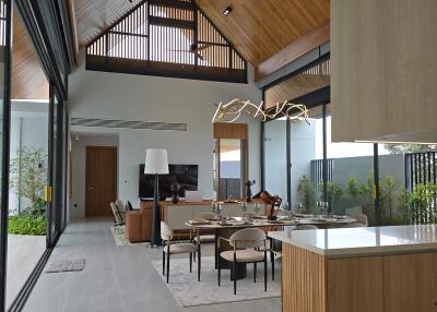 Open-concept living and dining area with modern design