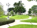 Well-maintained garden with lush greenery and walking paths