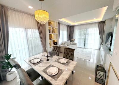 Modern living and dining area with elegant decor