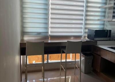 Minimalist kitchen with counter seating