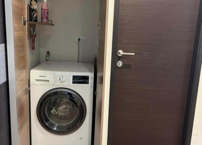 Small laundry area with washing machine