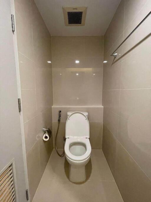 Minimalist bathroom with toilet