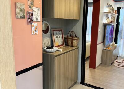 Modern kitchen area with appliances and decor