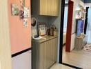 Modern kitchen area with appliances and decor