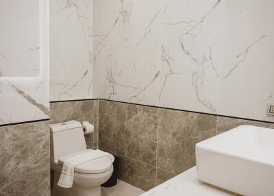 Modern bathroom with marble tiles