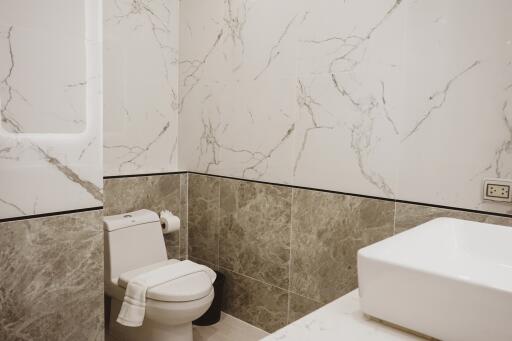 Modern bathroom with marble tiles