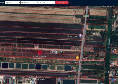 Aerial view of property layout showing plots and surrounding area