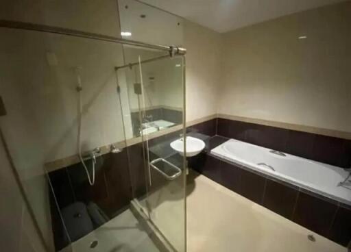 Modern bathroom with glass shower and bathtub