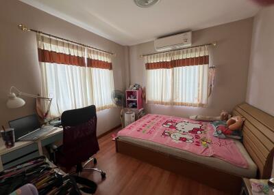 Cozy bedroom with ample natural light