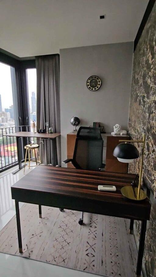 Modern home office with desk and city view