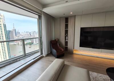 Modern living room with city and river view