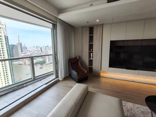 Modern living room with city and river view