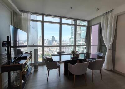 Modern dining room with city view and large windows