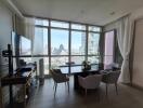 Modern dining room with city view and large windows