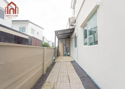 Outdoor pathway with side view of building