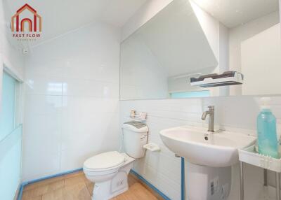 Modern bathroom with toilet and sink