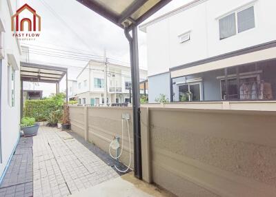 Clean and spacious backyard area with paving and garden