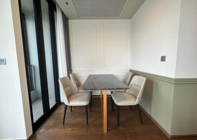 Dining area with table and chairs