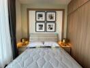 Modern bedroom with double bed, artwork, and bedside tables