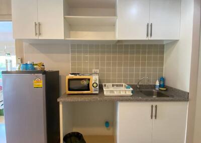 Modern kitchen with appliances and storage