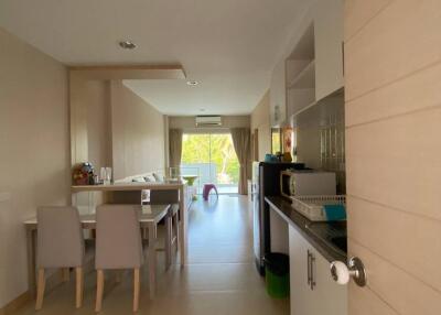 Modern kitchen and dining area with natural lighting