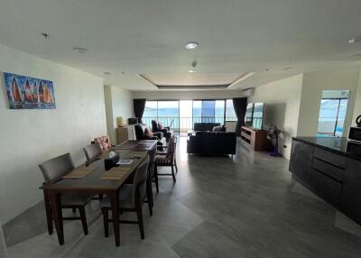 Spacious living room with dining area and ocean view