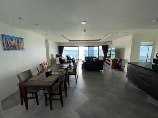 Spacious living room with dining area and ocean view