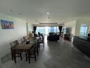 Spacious living room with dining area and ocean view