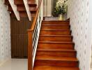 Staircase with wooden steps and decorative plant