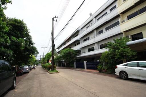 Exterior view of a row of residential buildings along a street