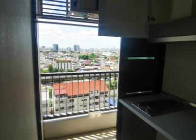 Small kitchen with balcony view