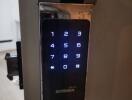 Digital keypad door lock with fingerprint scan